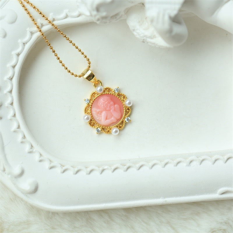 Cameo Cupid Necklace – White Mother-of-Pearl & Pink Queen Conch Shell Vintage Necklace