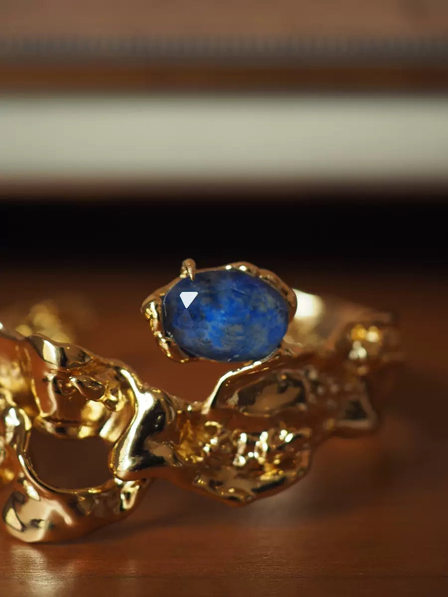 Modern Sculpted Open Bangle Bracelet with Blue Gemstone – Minimalist Gold Statement Jewelry