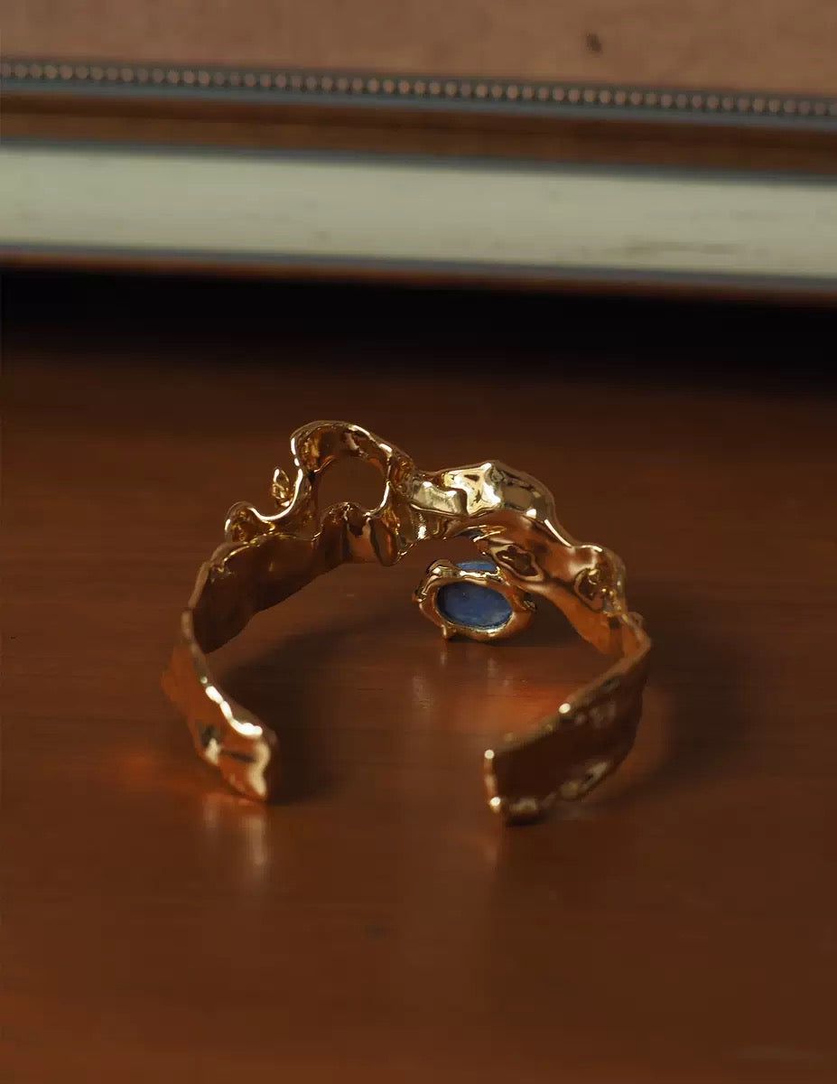 Modern Sculpted Open Bangle Bracelet with Blue Gemstone – Minimalist Gold Statement Jewelry