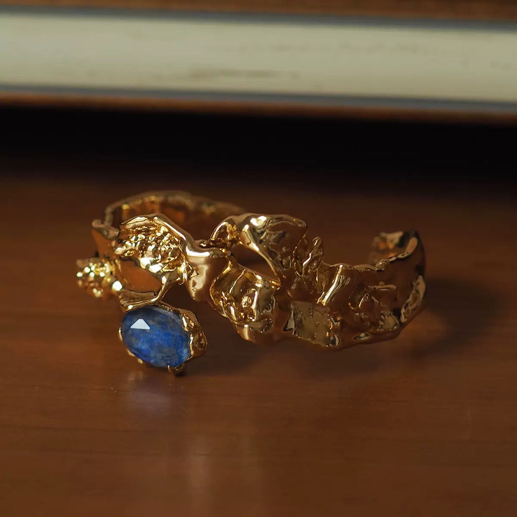 Modern Sculpted Open Bangle Bracelet with Blue Gemstone – Minimalist Gold Statement Jewelry
